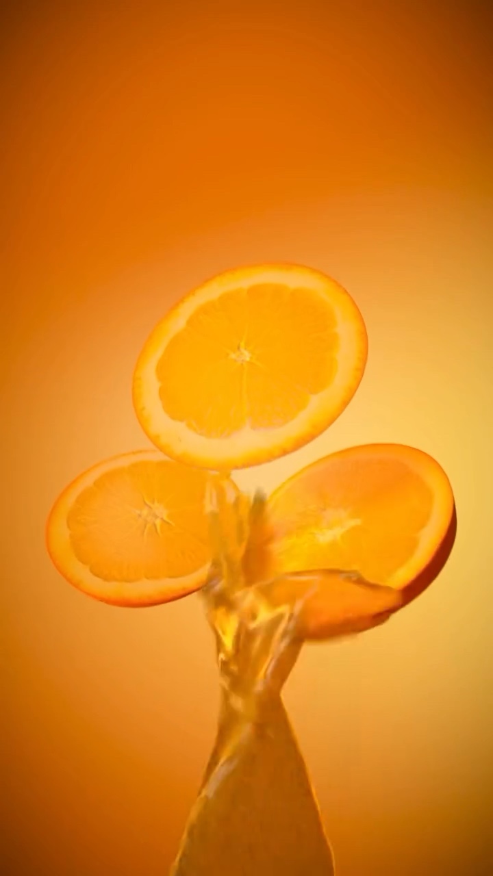 X-Particles: Oranges in a Juice Splash – Still 1