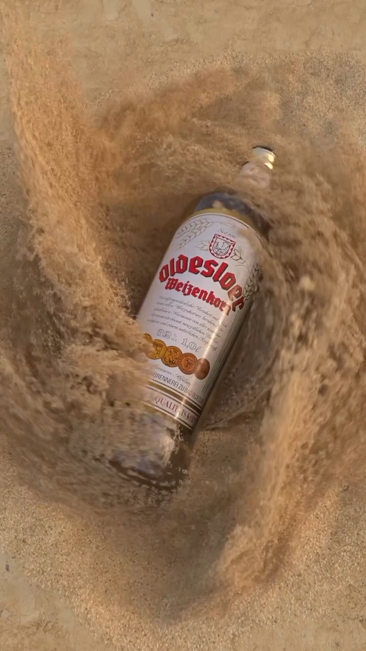 Oldesloer Spec Ad – Flasche im Küstensand – Standbild 2